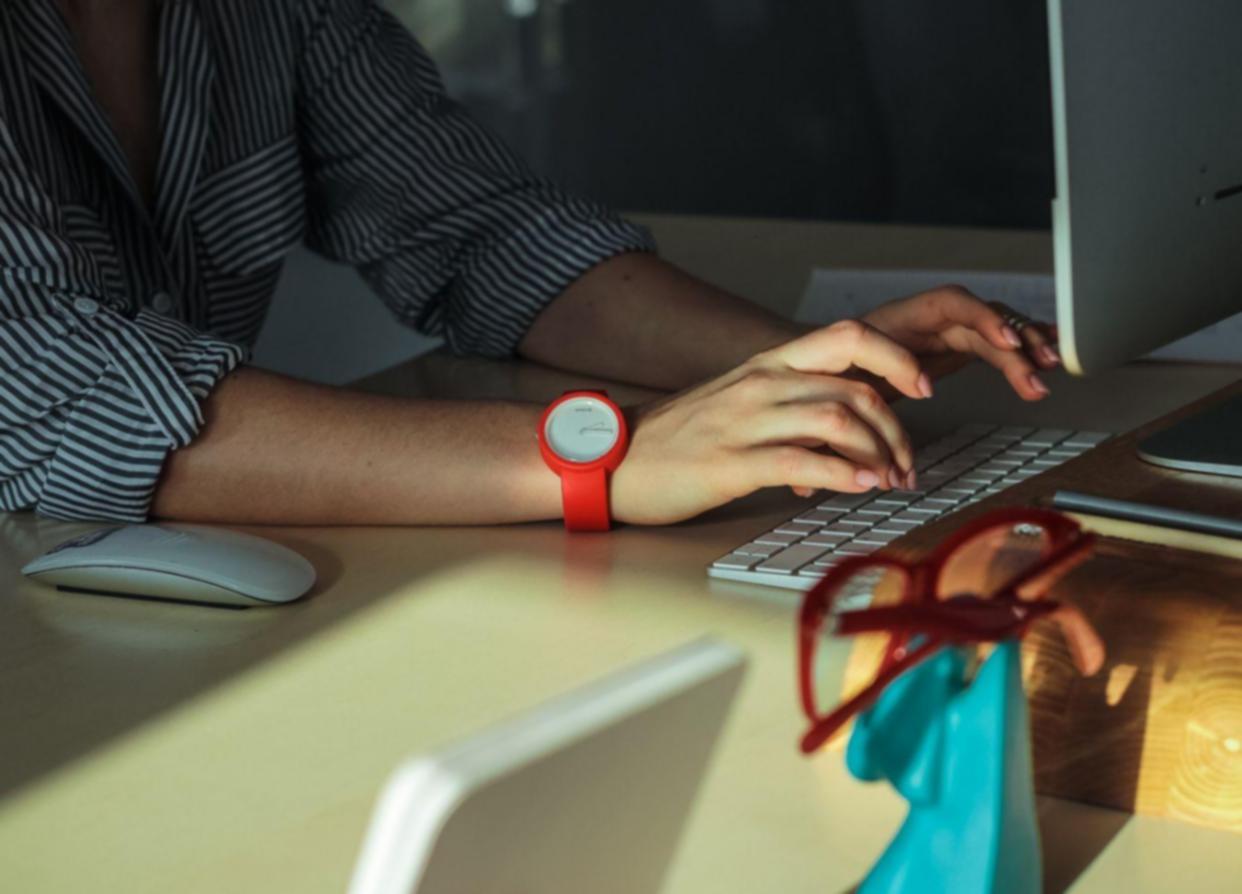 Student reviewing financial calculations on tablet